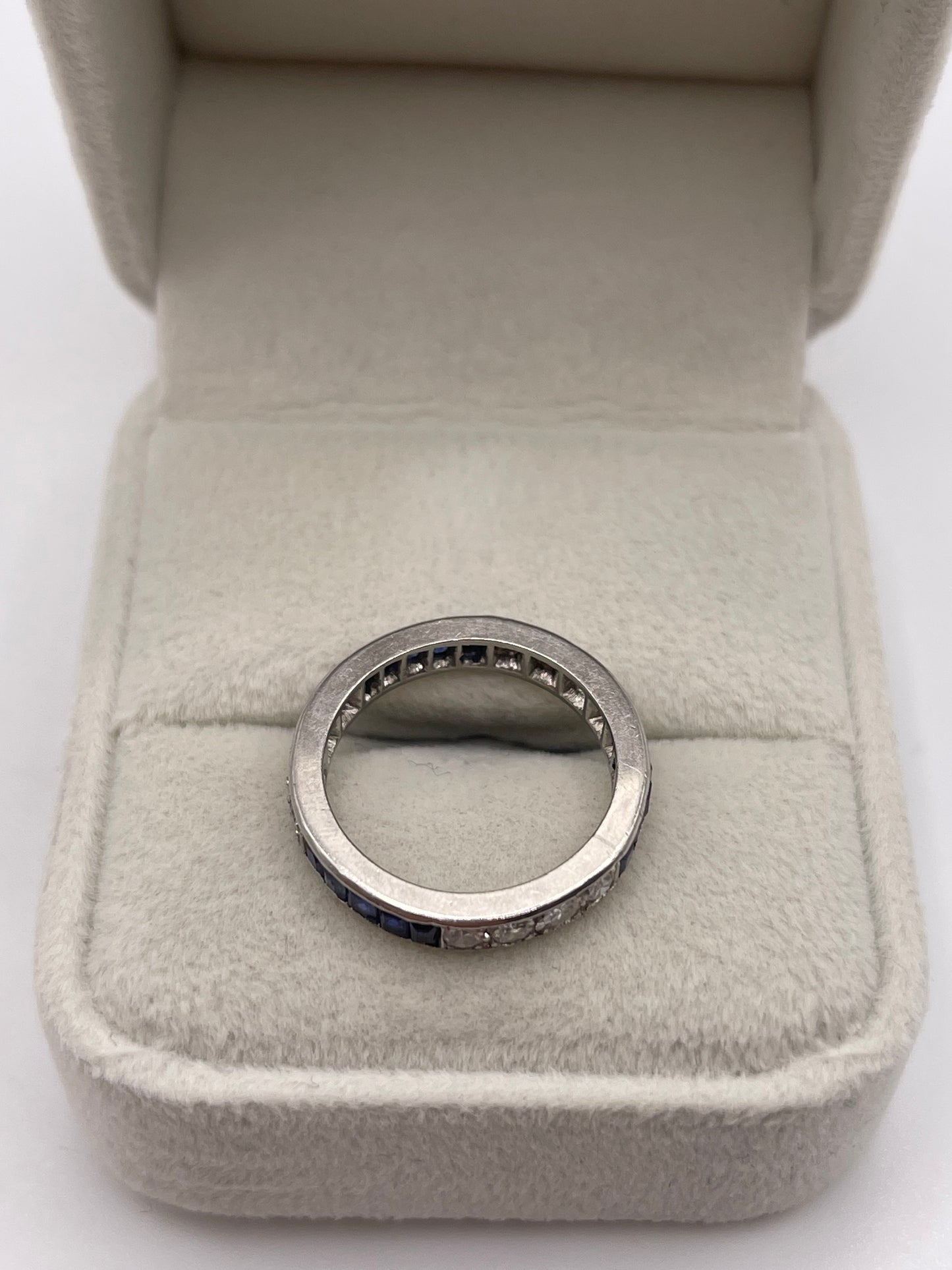 Platinum sapphire and diamond full eternity ring