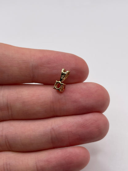 9ct gold orange sapphire pendant