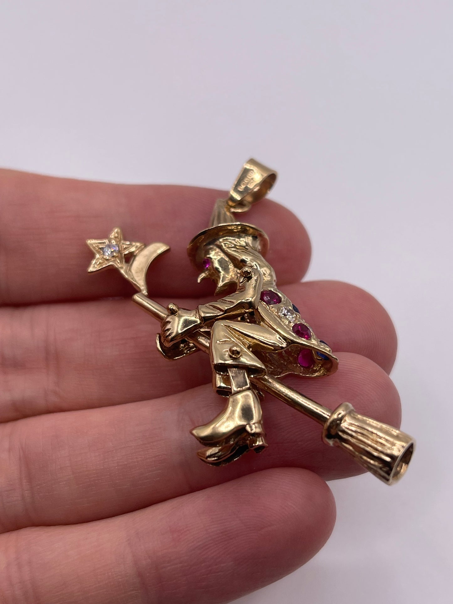 9ct gold articulated witch pendant