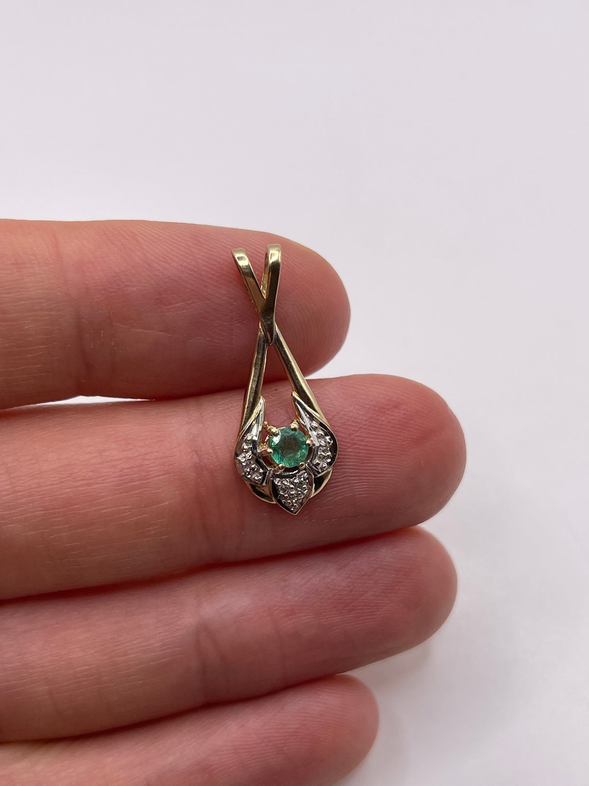 9ct gold emerald and diamond pendant
