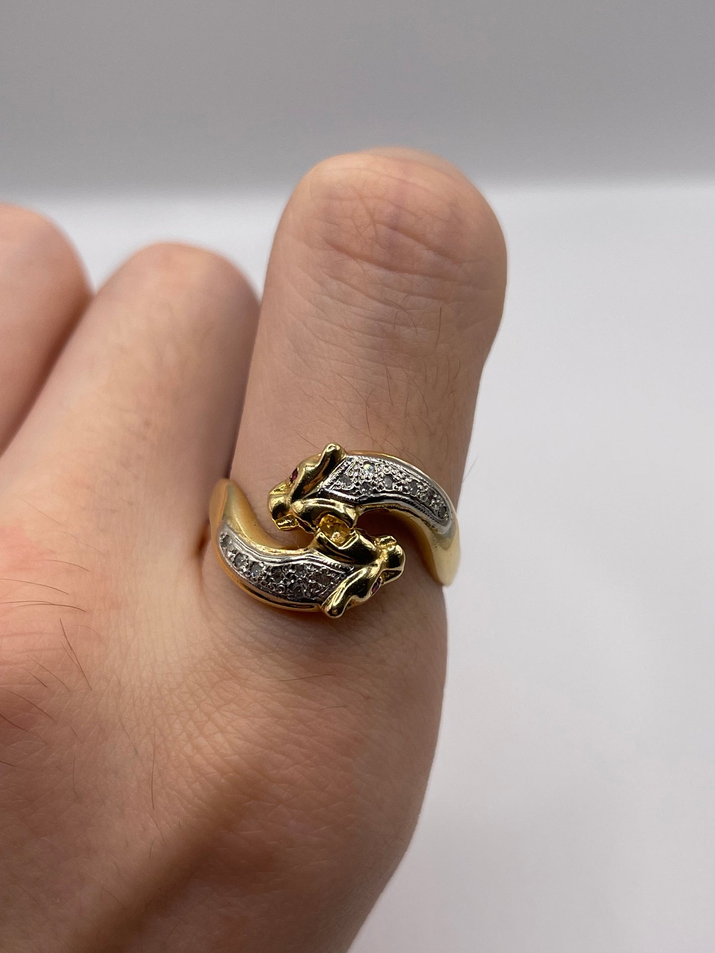 18ct gold ruby and diamond double panther ring