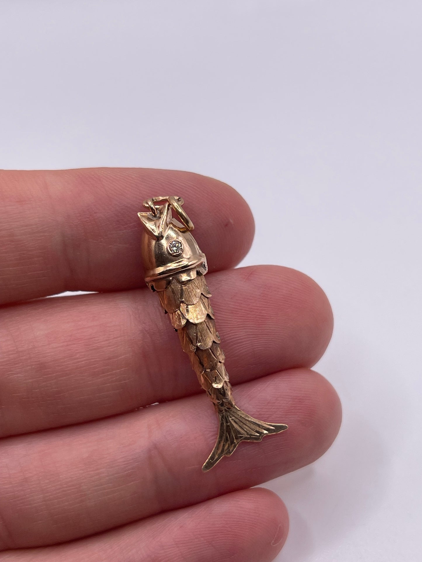 14ct rose gold diamond articulated fish pendant
