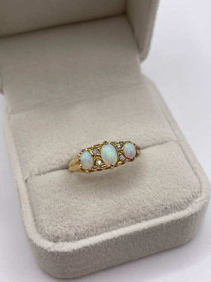 18ct gold opal and diamond ring