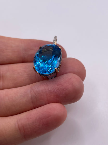 9ct gold blue topaz and diamond pendant