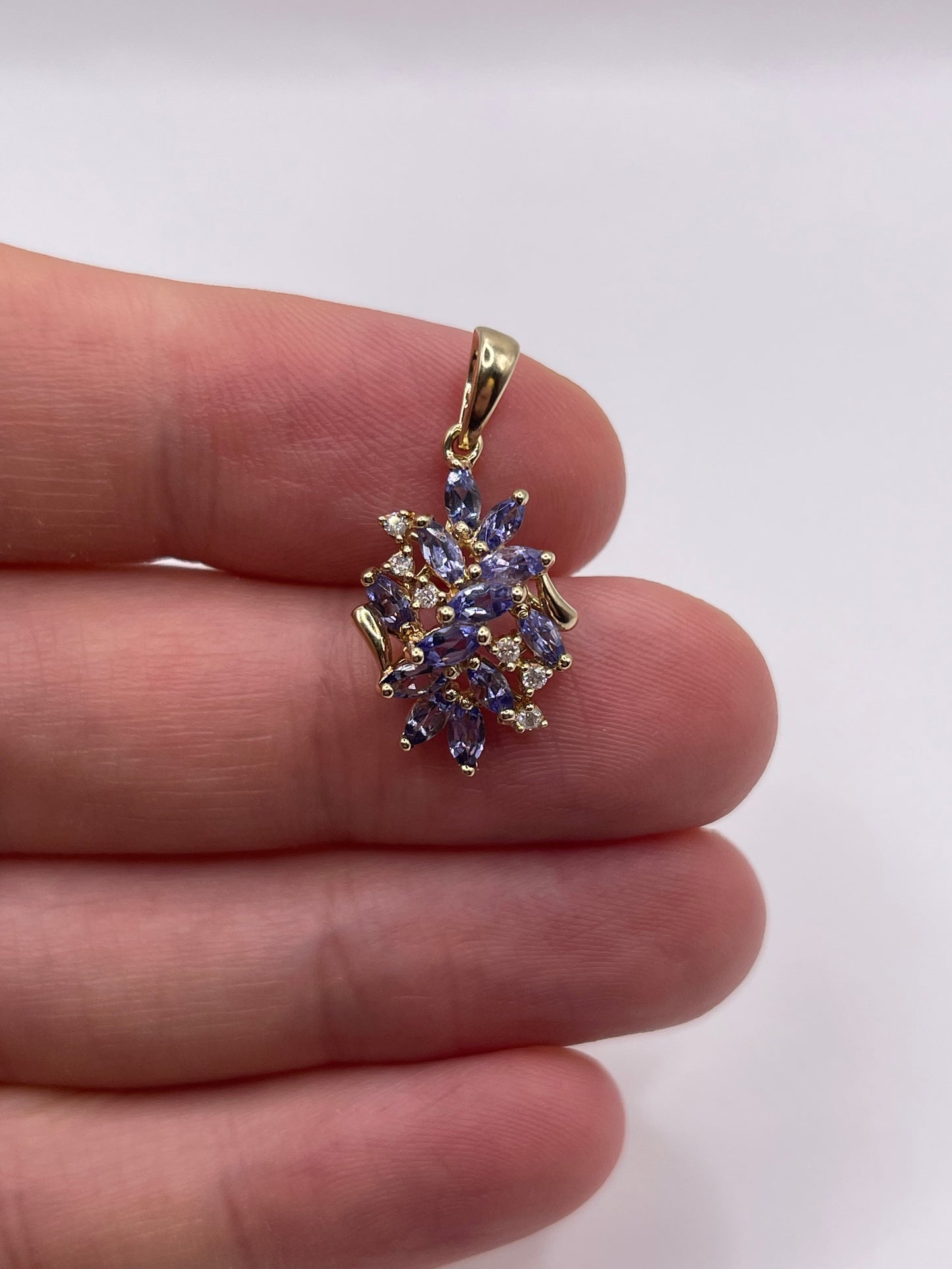 9ct gold tanzanite and diamond pendant