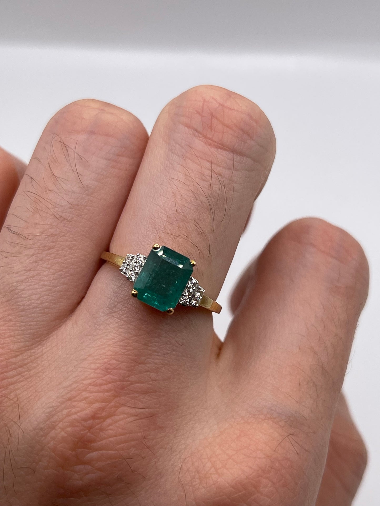 9ct gold emerald and zircon ring