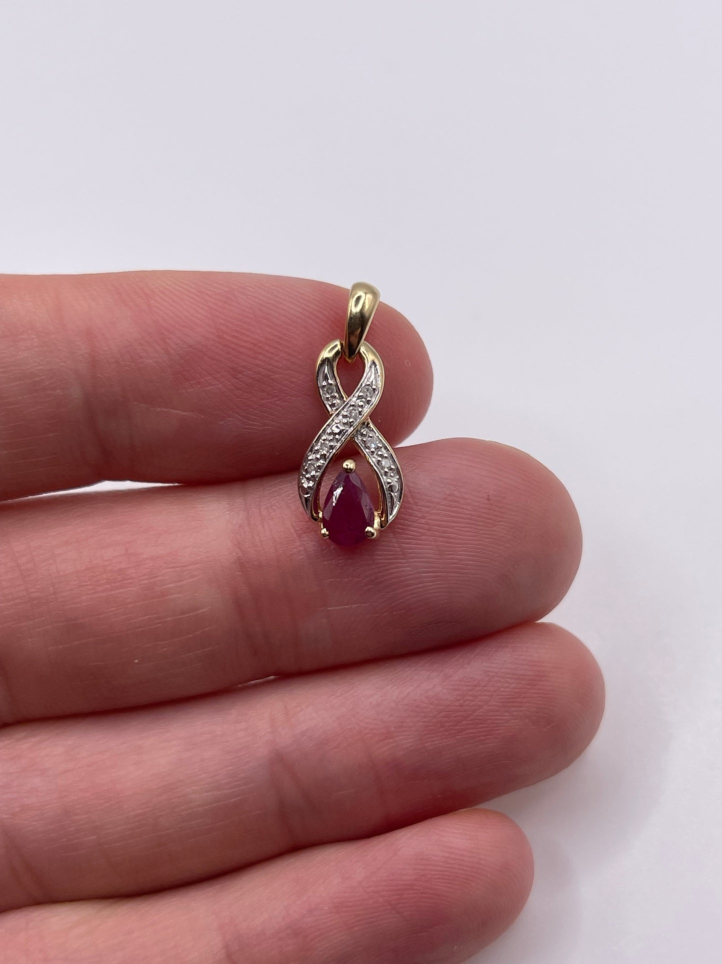 9ct gold ruby and diamond pendant