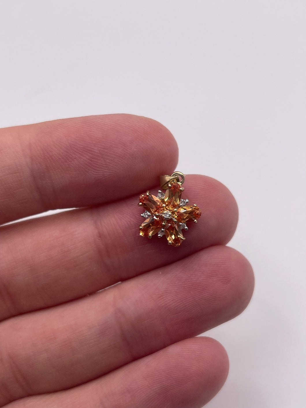 9ct gold orange sapphire and diamond pendant