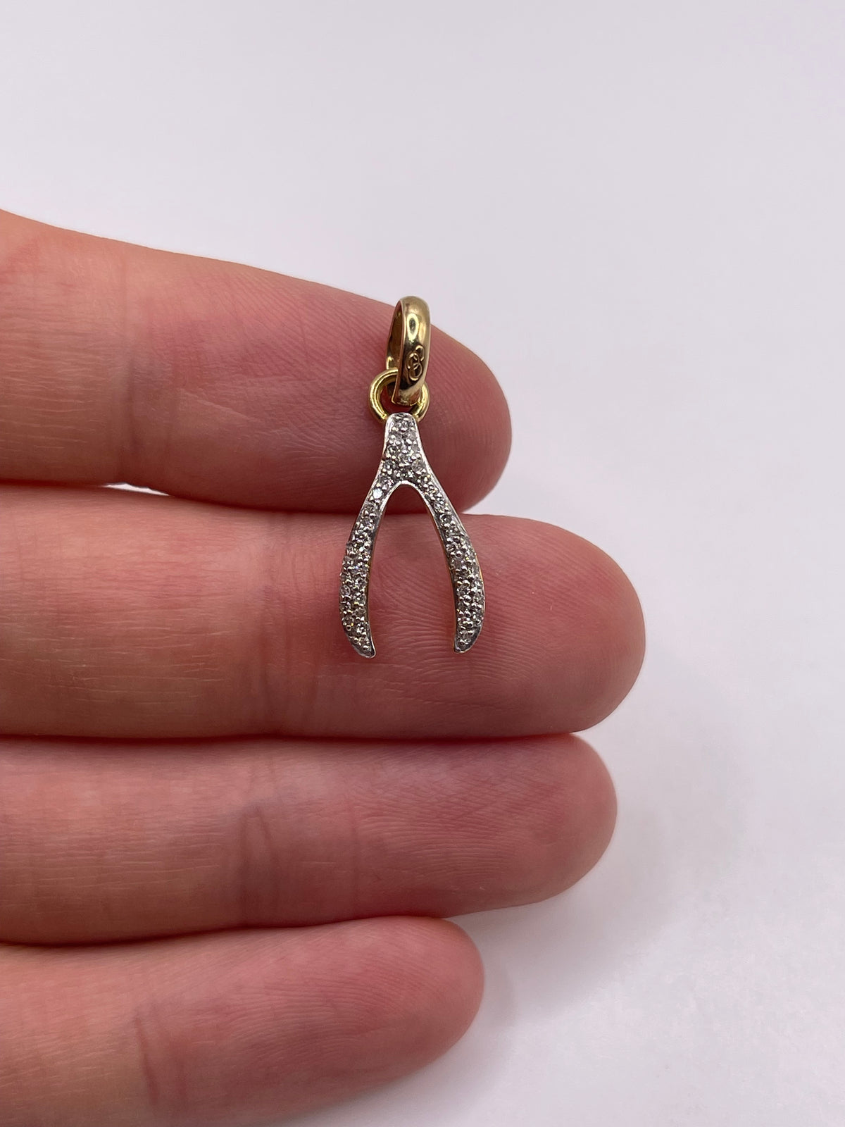 18ct gold diamond wishbone pendant