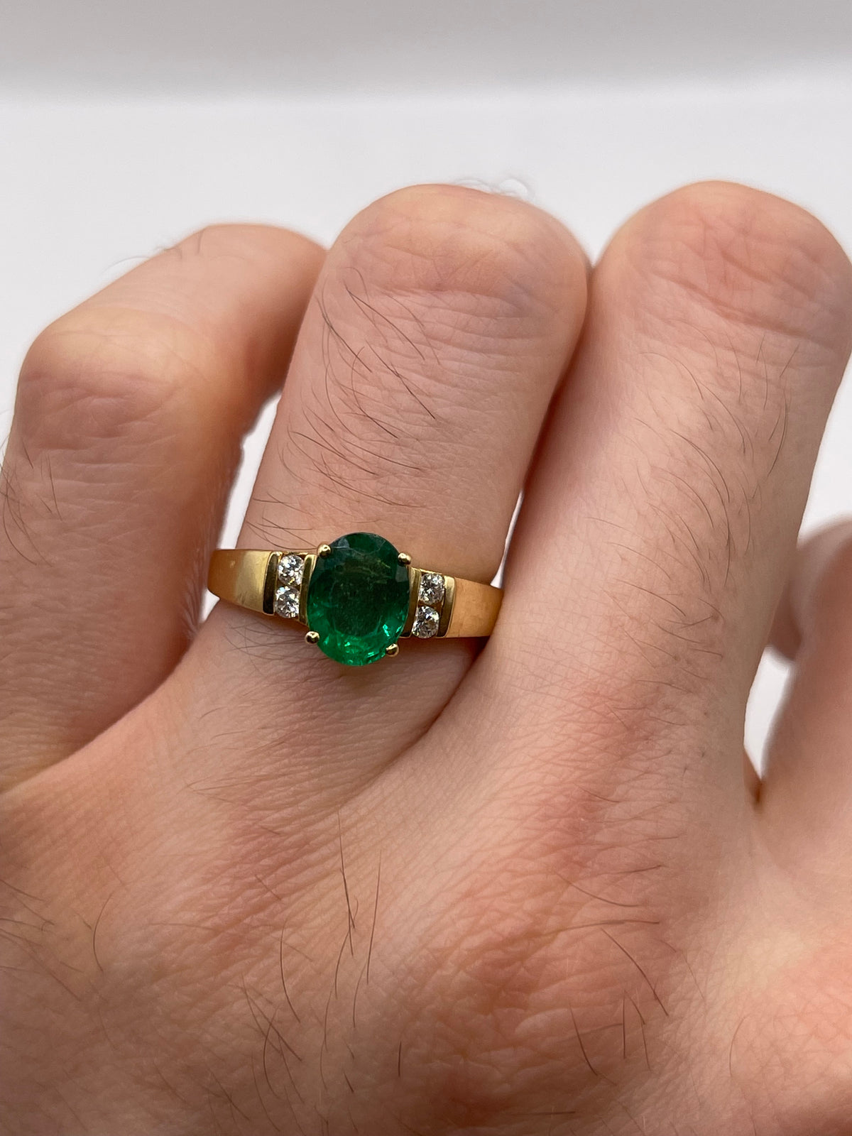 18ct gold emerald and diamond ring