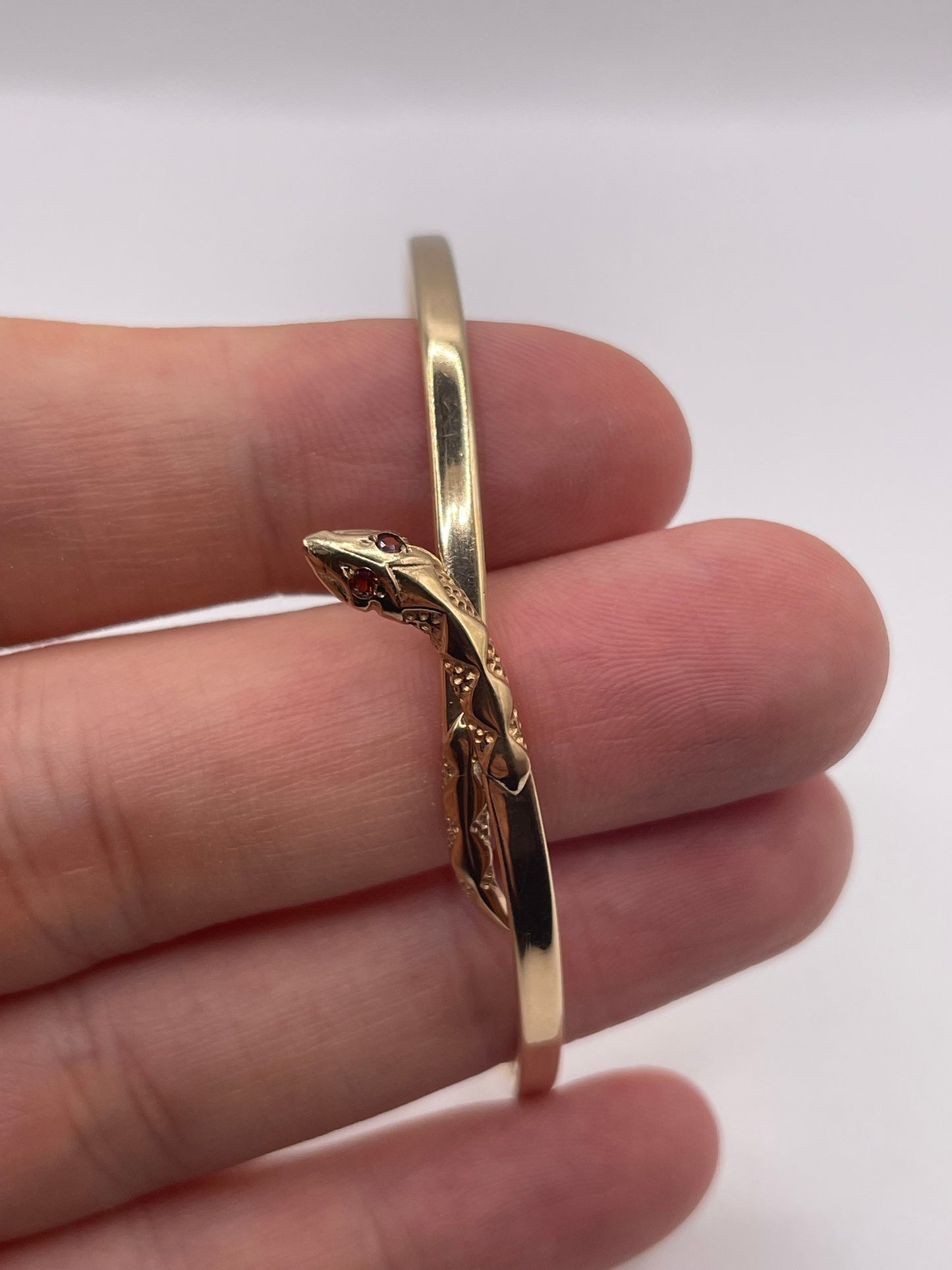 9ct gold garnet snake bangle