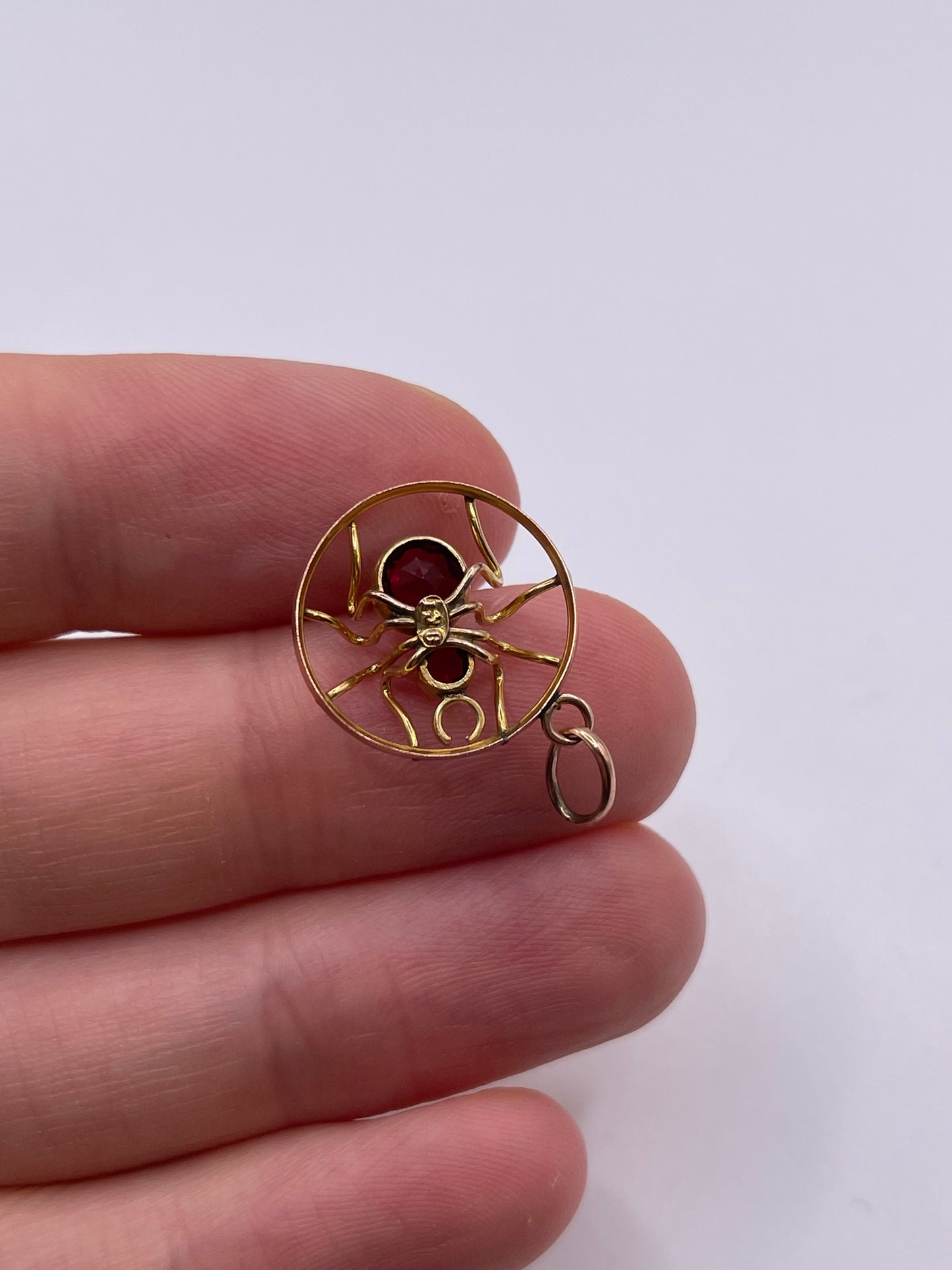 Antique 9ct gold paste spider pendant