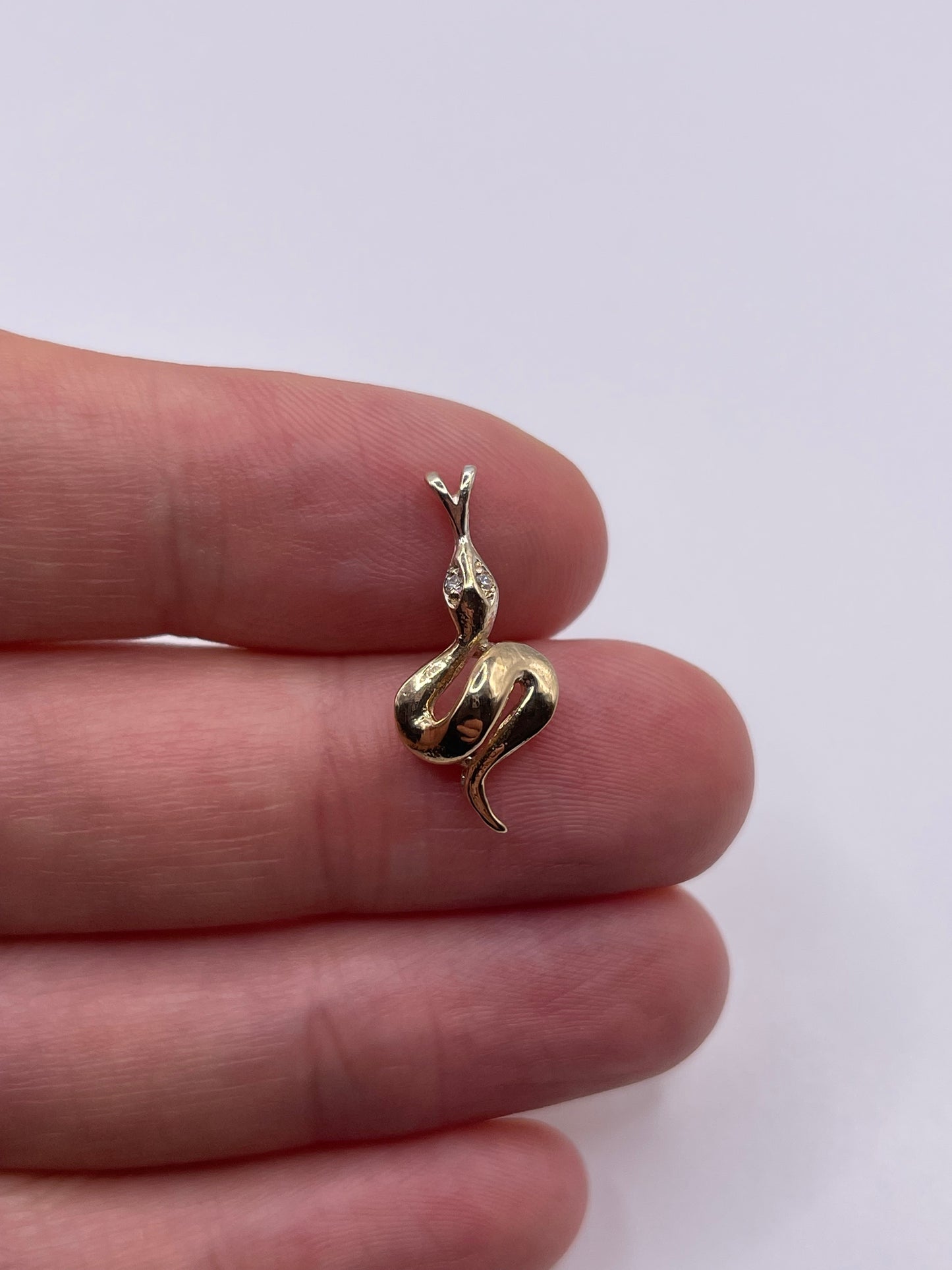 9ct gold diamond snake pendant