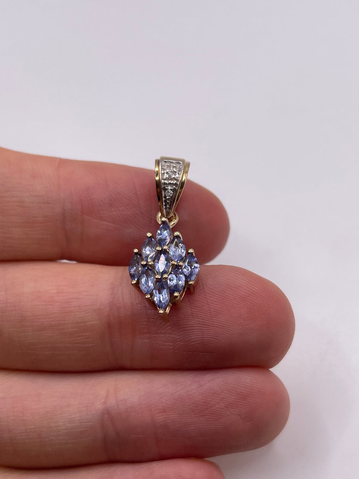 9ct gold tanzanite and diamond pendant