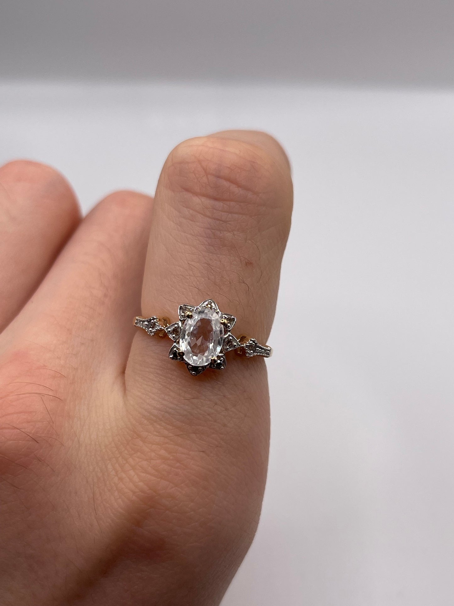 9ct gold zircon and diamond ring