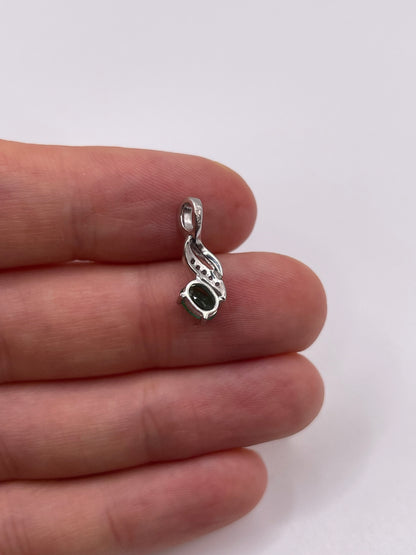 9ct white gold emerald and diamond pendant