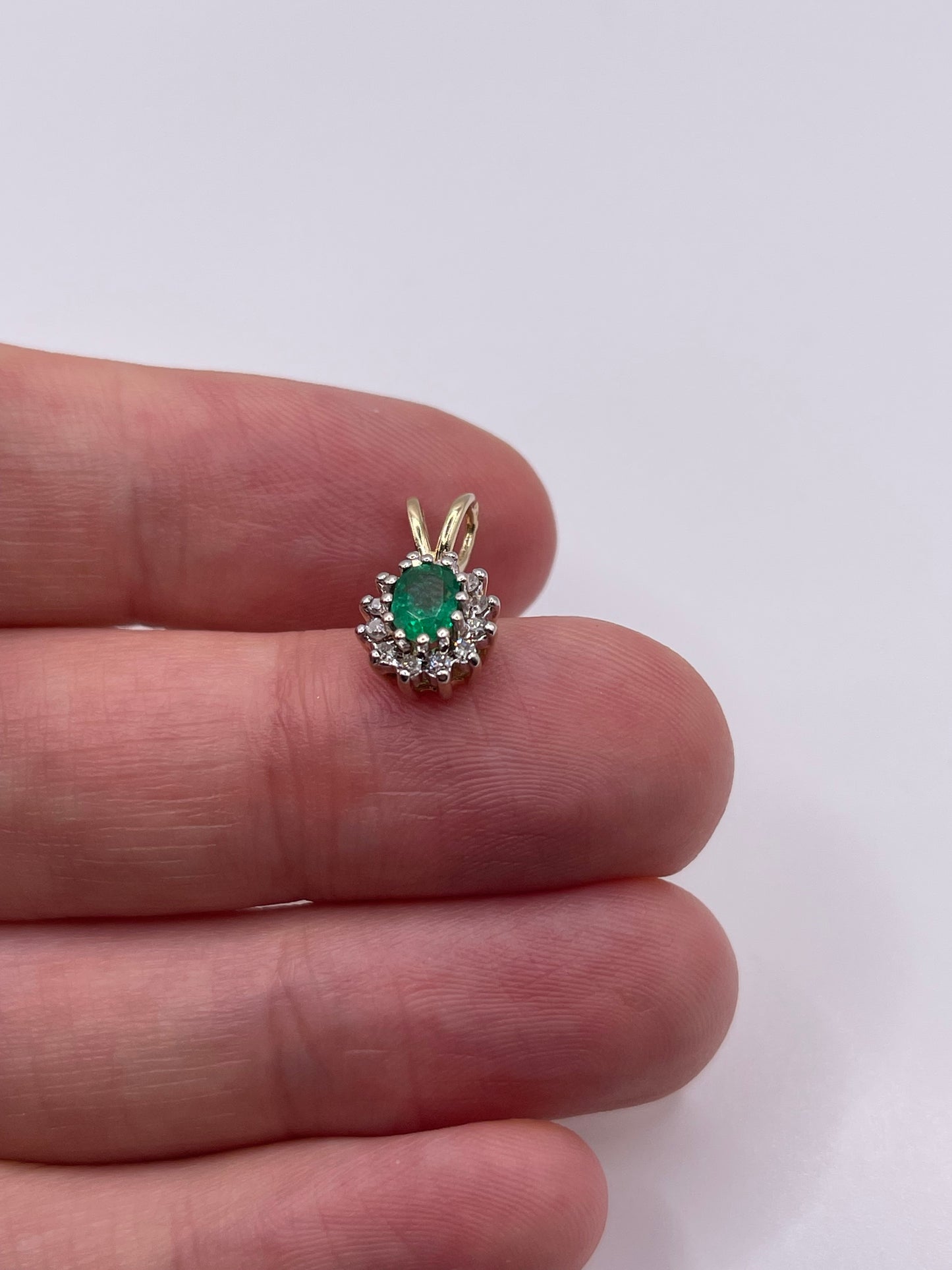 9ct gold emerald and diamond pendant