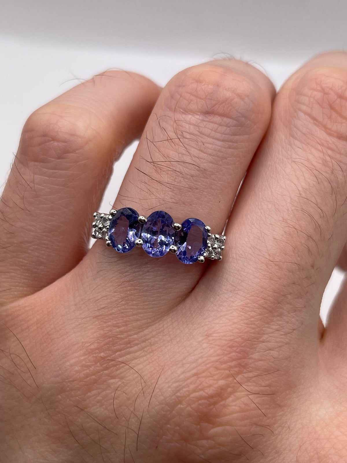 9ct white gold tanzanite and zircon ring