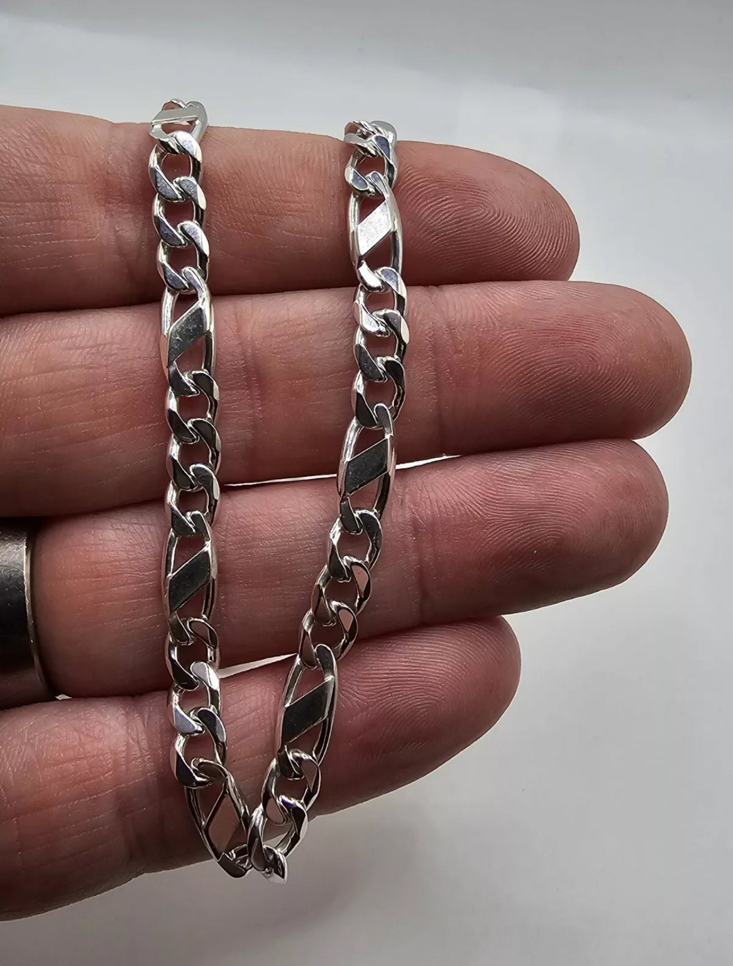 Solid silver figaro chain