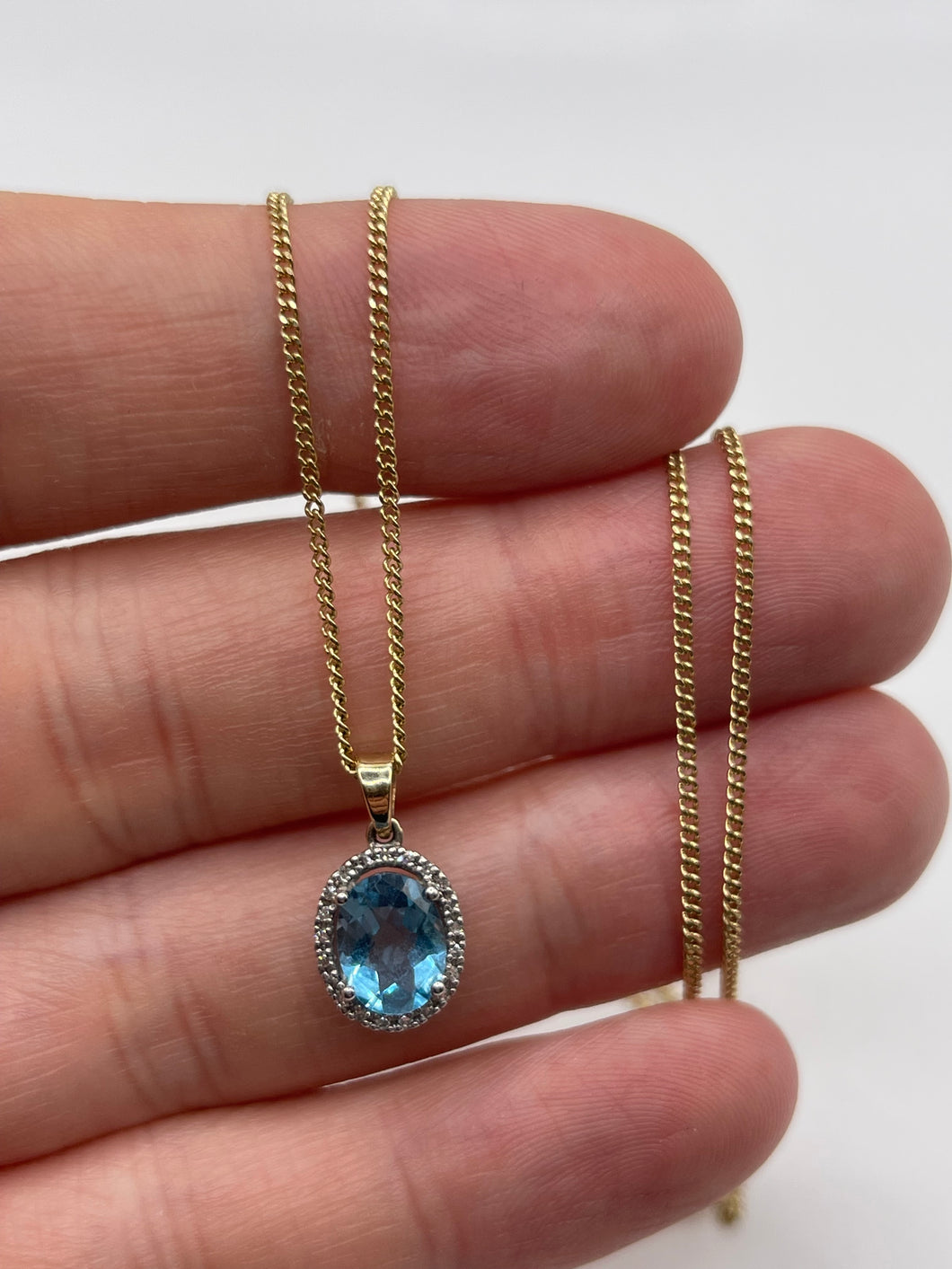 9ct gold blue topaz and diamond necklace