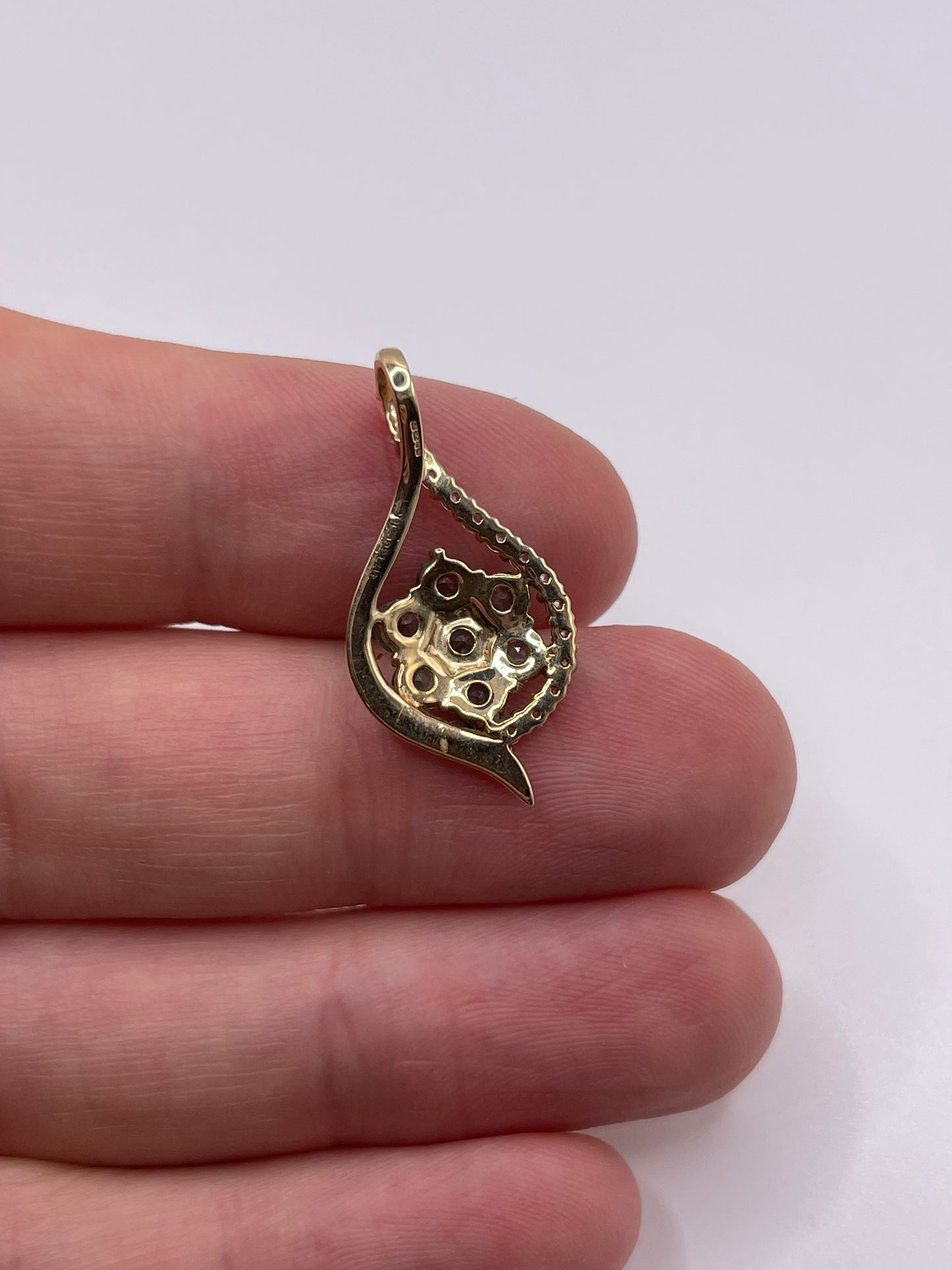 9ct gold emerald and zircon pendant