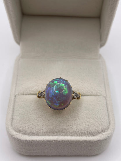 18ct gold solid black opal and diamond ring