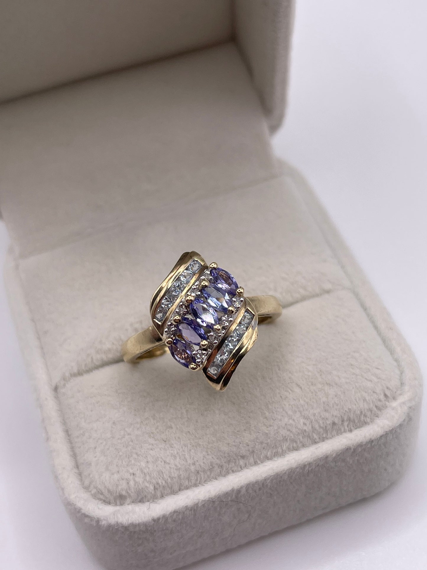 9ct gold tanzanite, aquamarine and diamond ring
