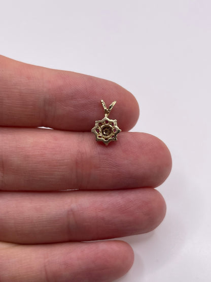 9ct gold ruby and diamond pendant