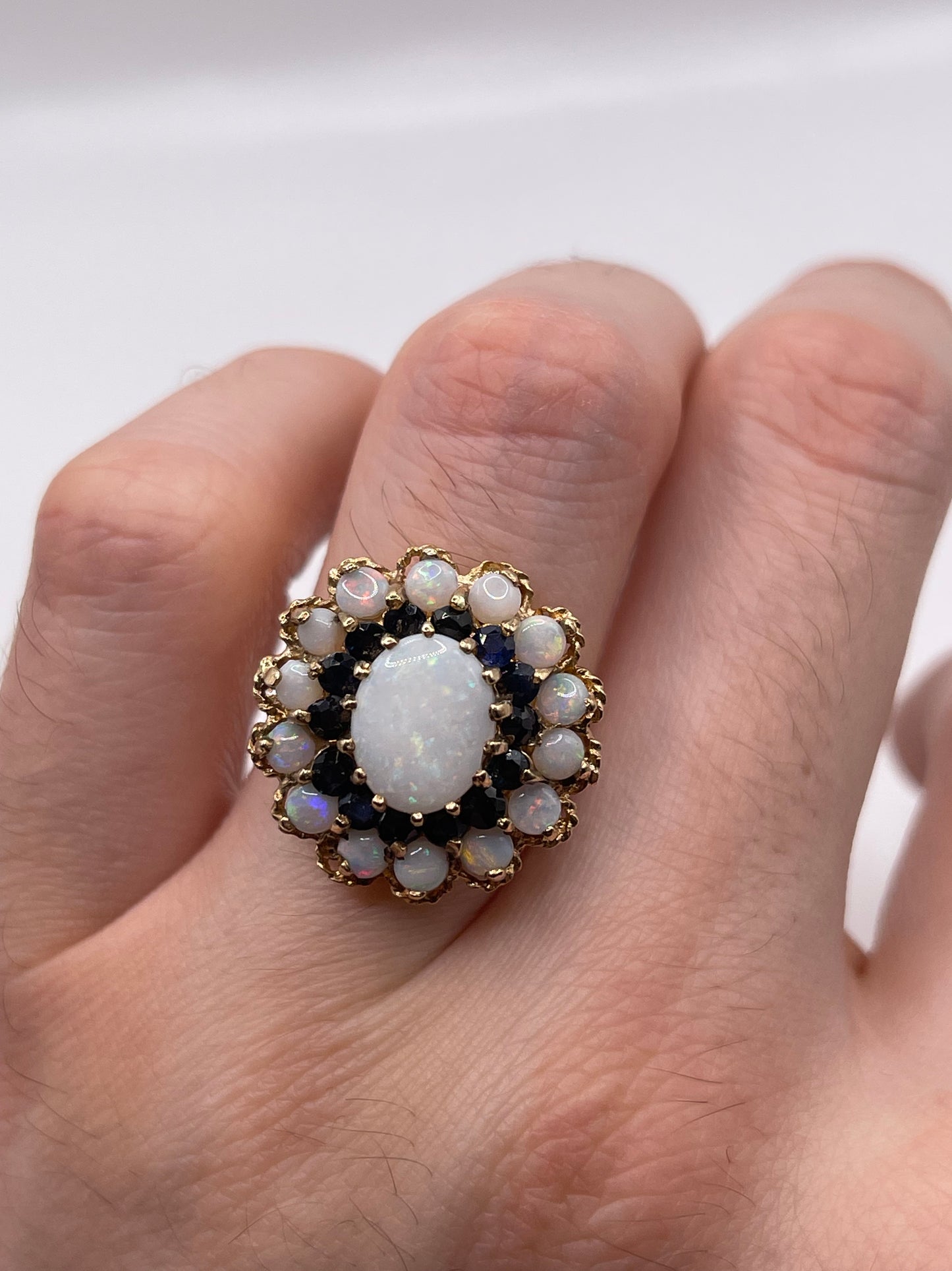 Heavy 9ct gold opal and sapphire cluster ring
