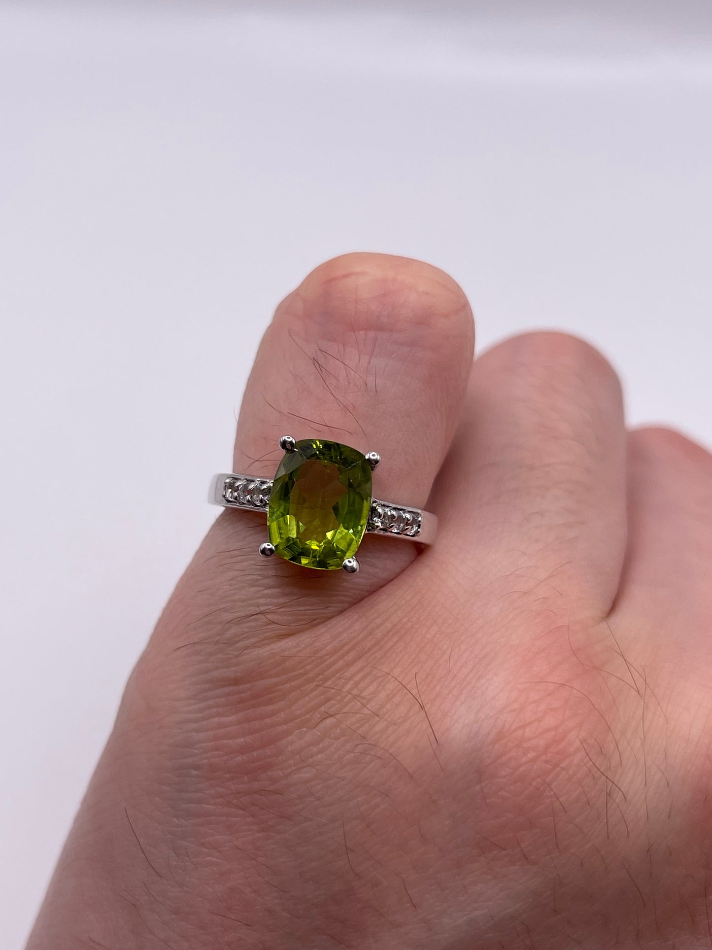 Silver peridot and topaz ring