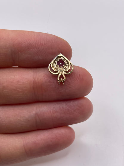 9ct gold ruby and diamond pendant