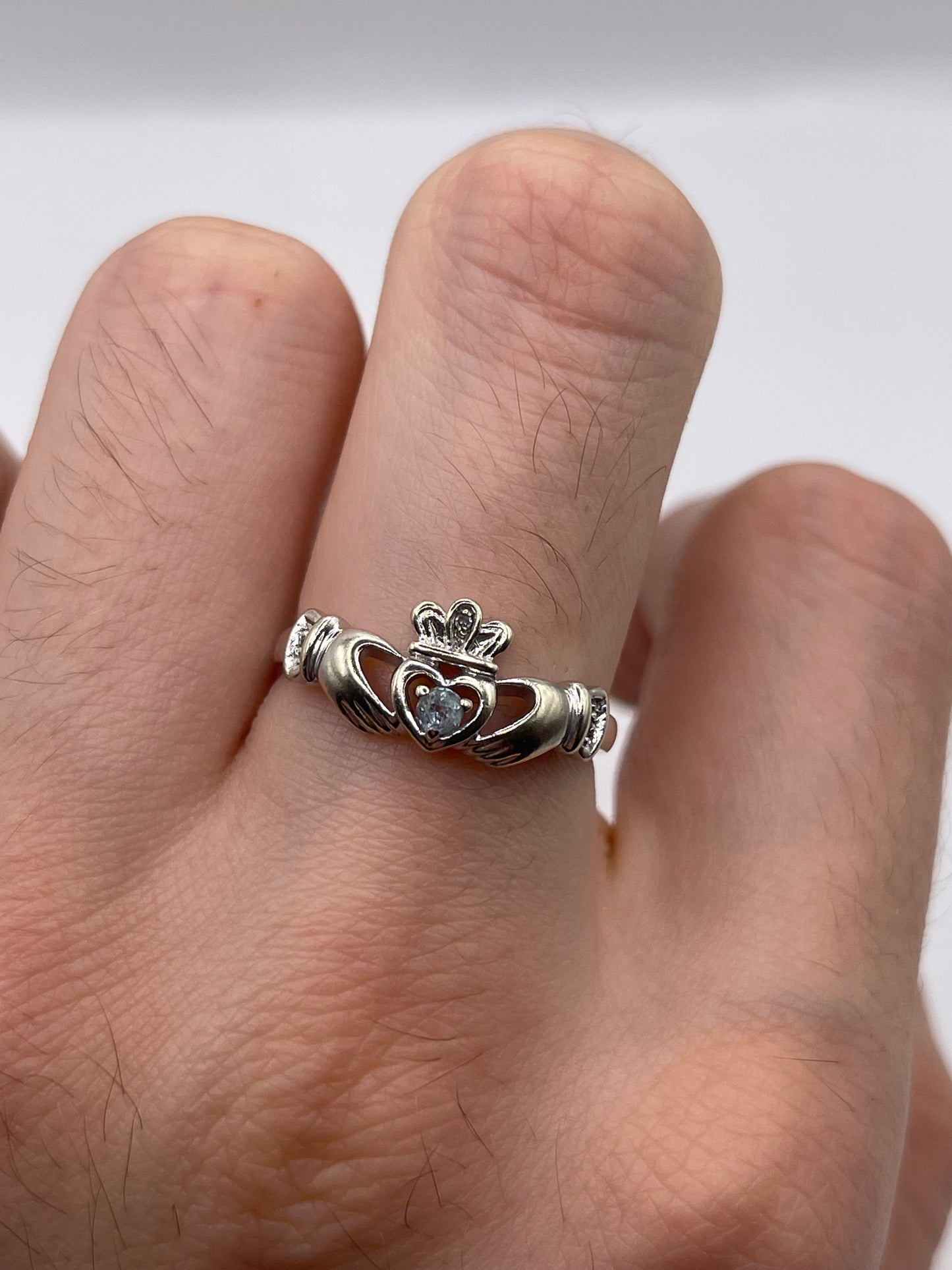 9ct white gold aquamarine and diamond claddagh ring
