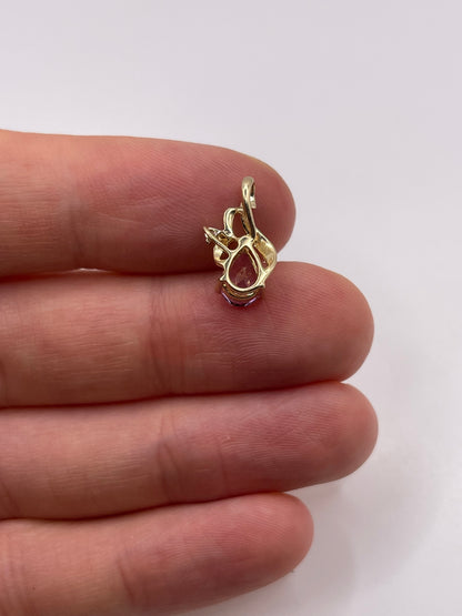9ct gold pink topaz and diamond pendant
