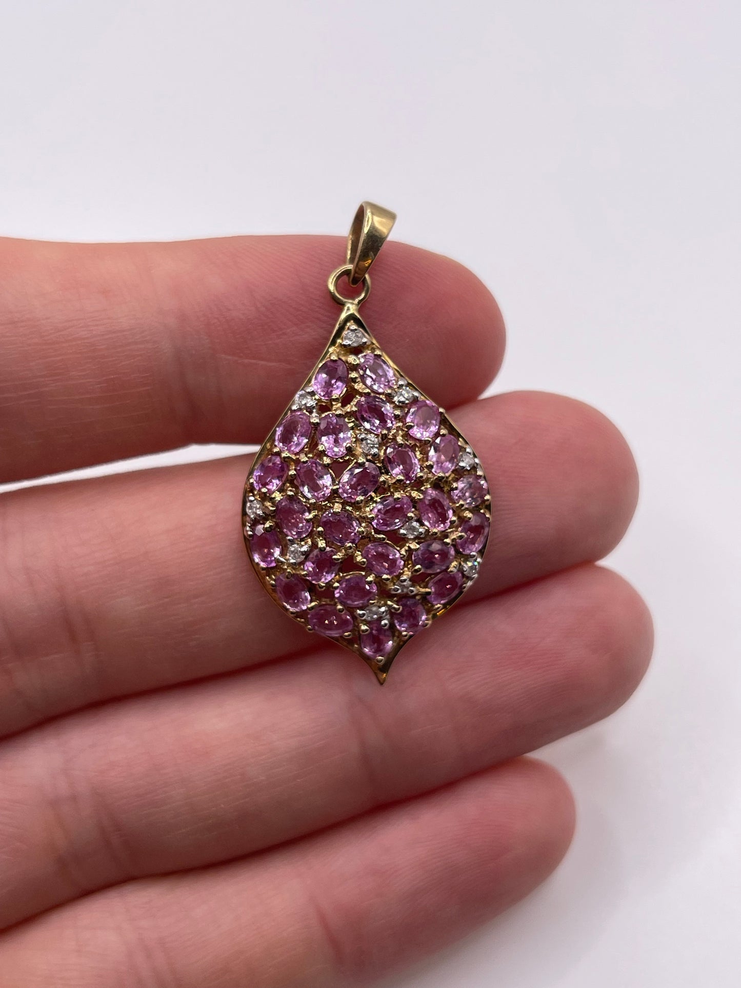 9ct gold pink sapphire and diamond pendant