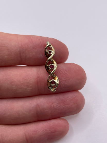 9ct gold ruby and diamond pendant