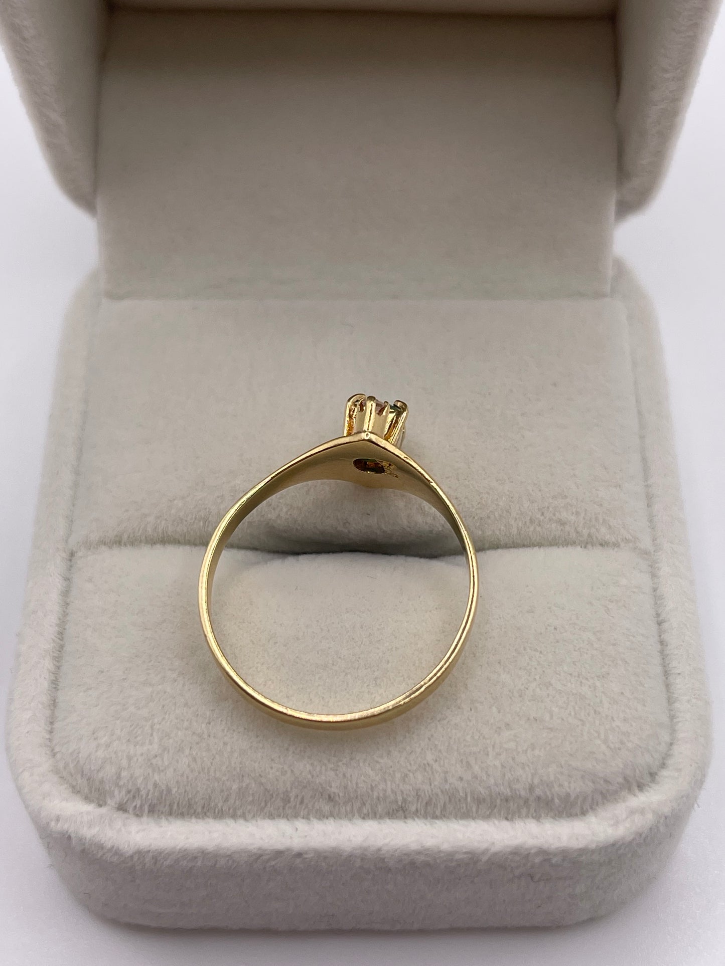 18ct gold emerald and zircon ring