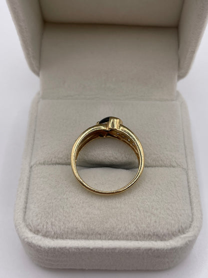 9ct gold cabochon sapphire and zircon ring