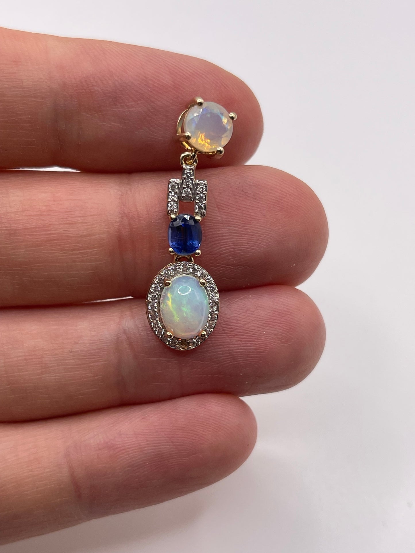 9ct gold opal, kyanite and zircon pendant