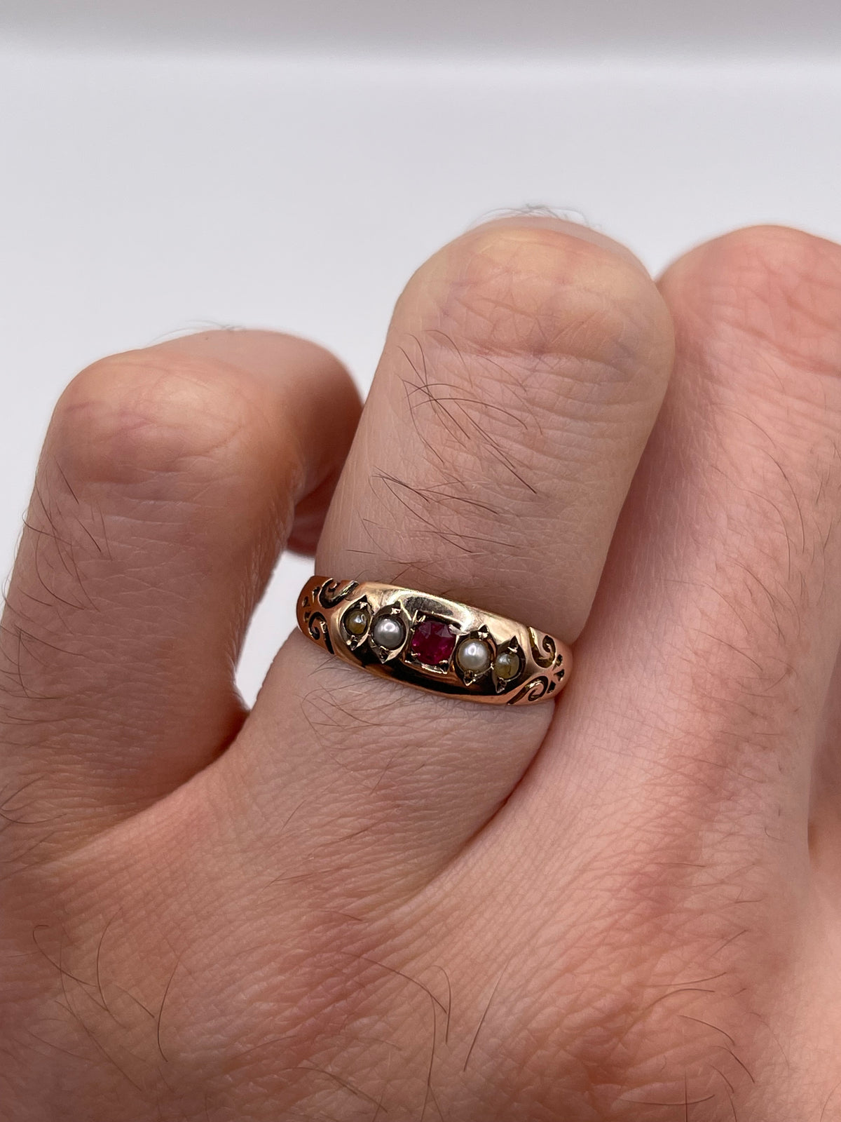 Antique 9ct rose gold ruby and pearl ring