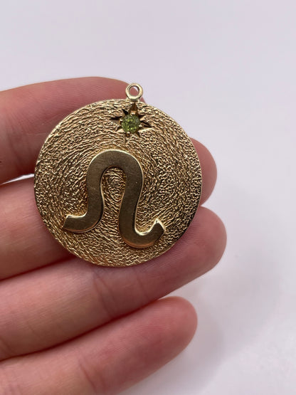 Heavy 9ct gold peridot Leo pendant