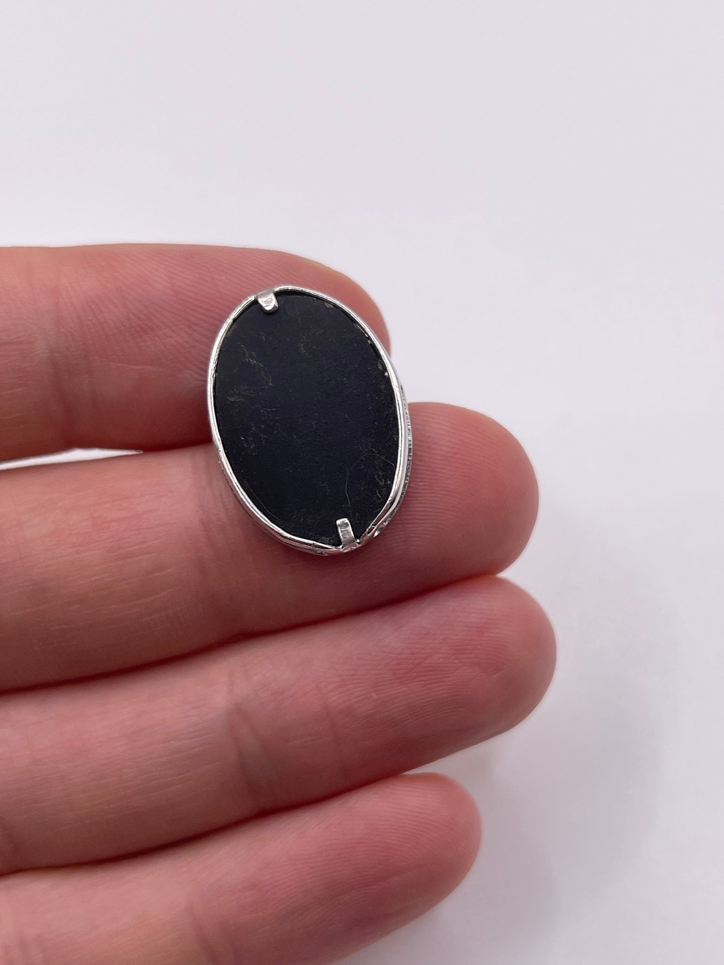9ct white gold onyx and diamond pendant