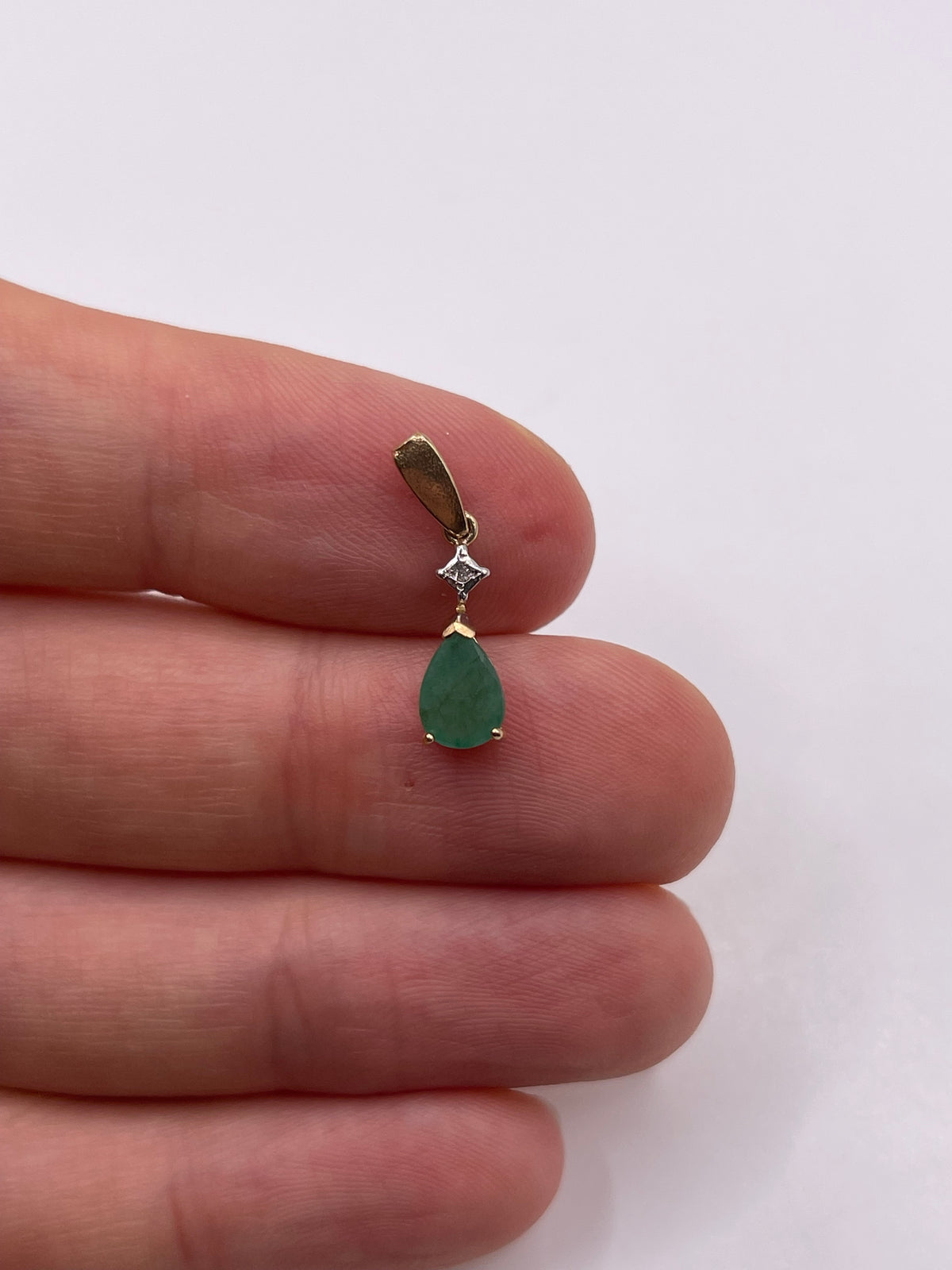 9ct gold emerald and diamond pendant