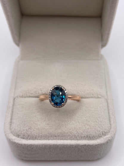 9ct rose gold blue topaz and diamond ring