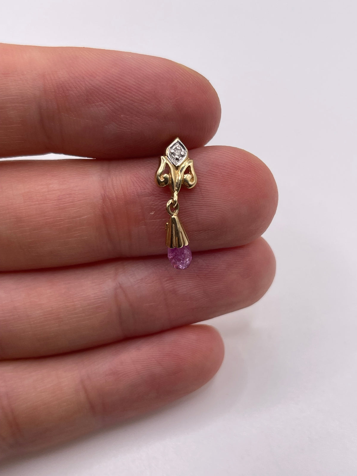9ct gold pink sapphire and diamond pendant