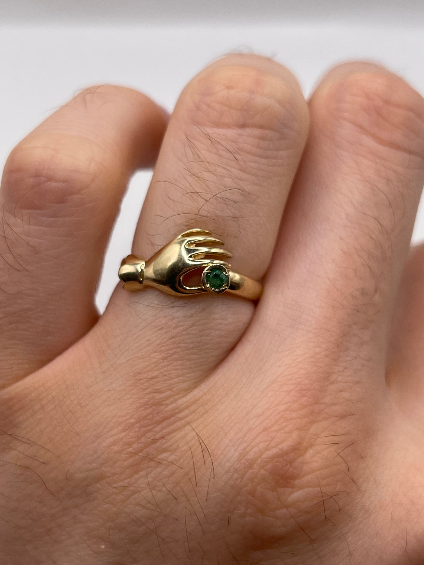 9ct gold emerald hand ring