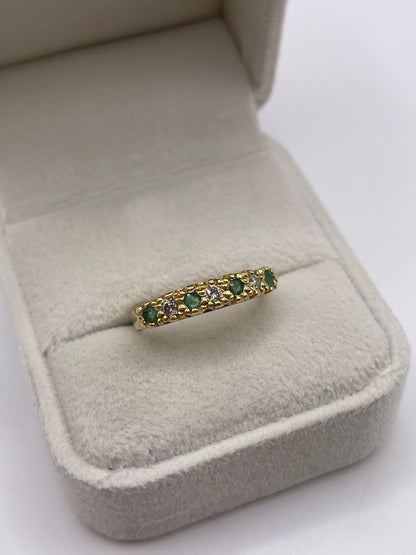 18ct gold emerald and diamond ring