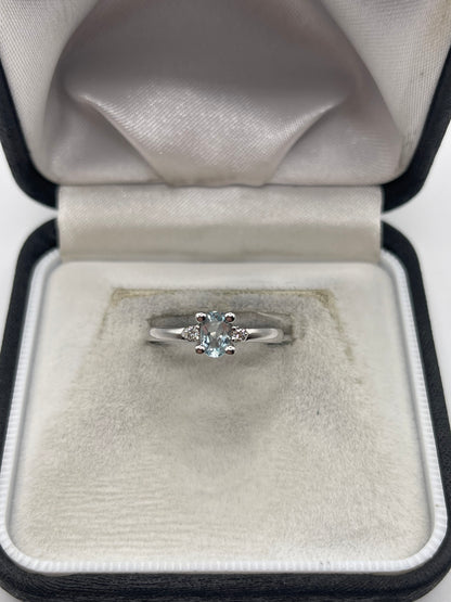 9ct white gold topaz and diamond ring