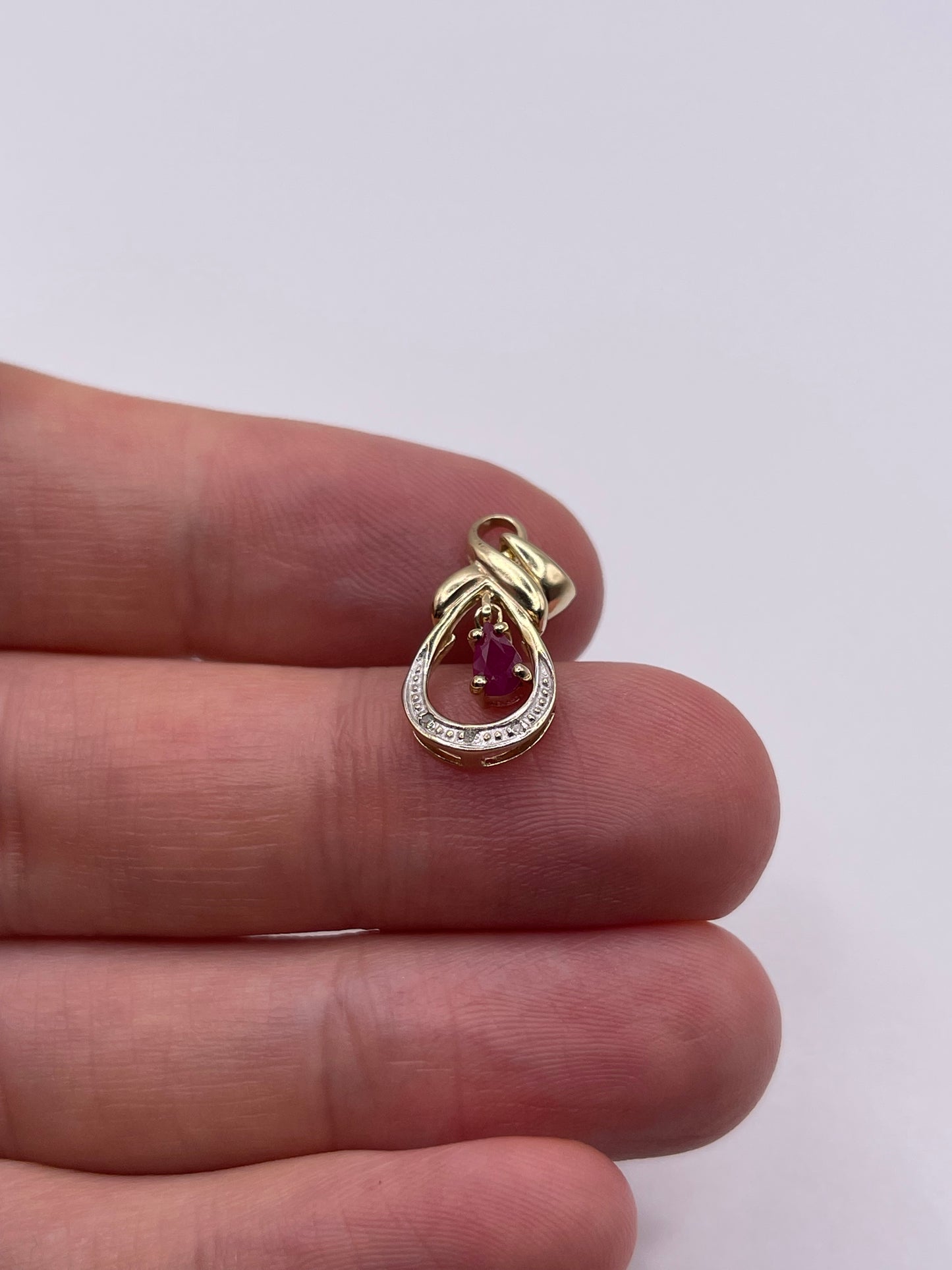 9ct gold ruby and diamond pendant