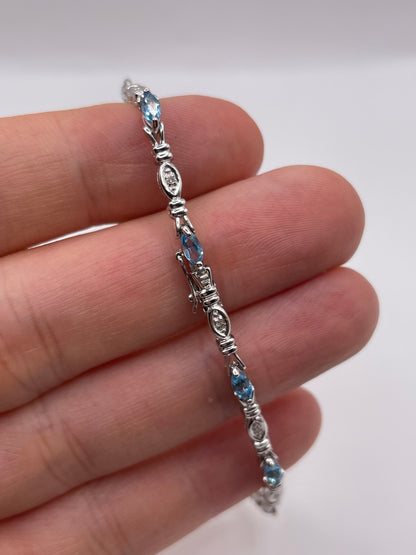 9ct white gold topaz and diamond bracelet