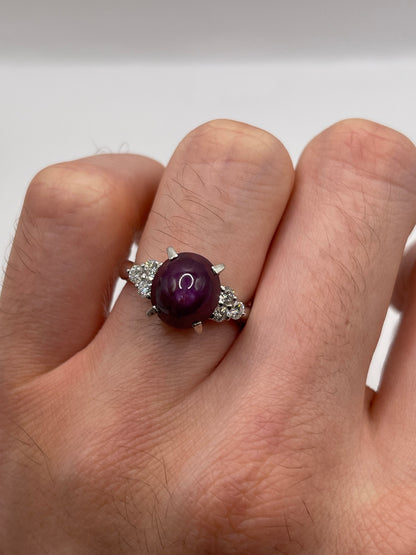Platinum star ruby and diamond ring